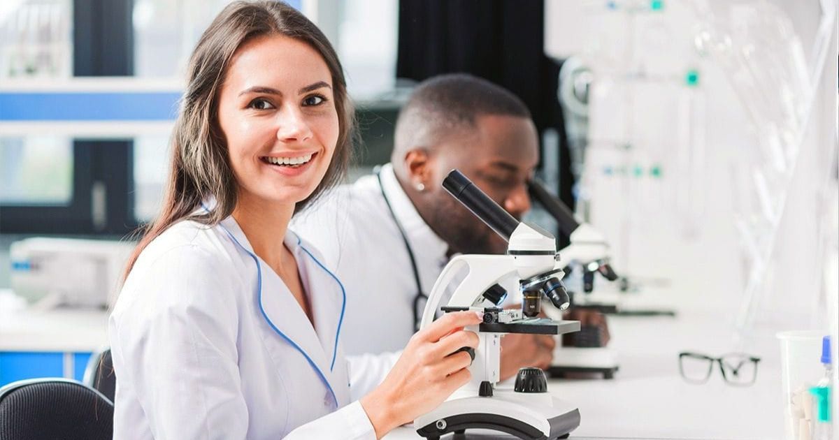 Image of two scientists working on Oligonucleotide Bioanalysis Challenges and Regulatory Solutions at Agilex Biolabs bioanalysis laboratory enviorenment.